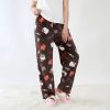 Pyjama Polaire Hello Kitty noir porté par une femme​